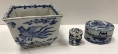 A blue and white porcelain chinoiserie decorated cylindrical scribe's pot bearing four character
