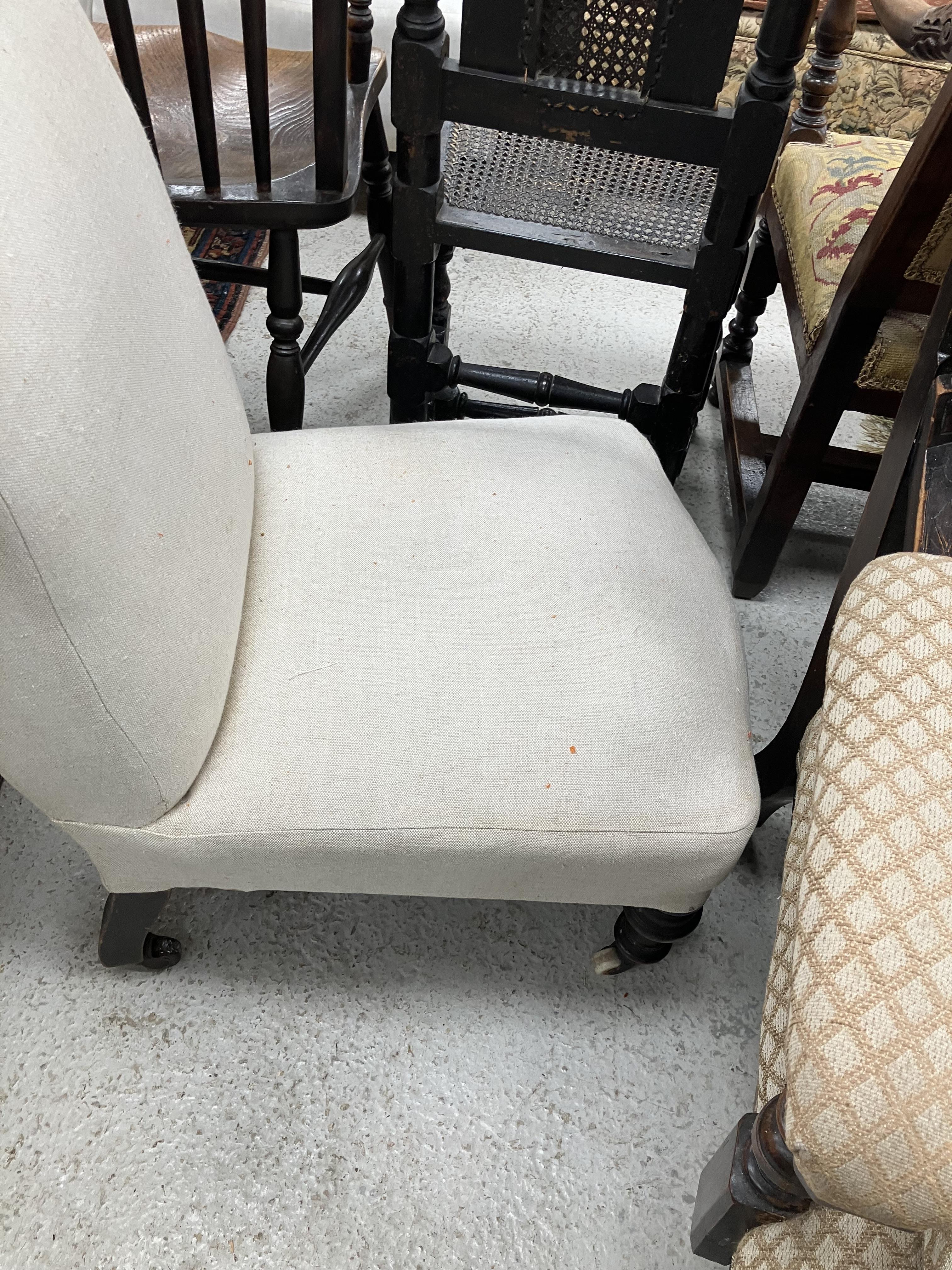 A Victorian upholstered scroll arm chair on ebonised turned front legs to later brass castors, - Image 8 of 52