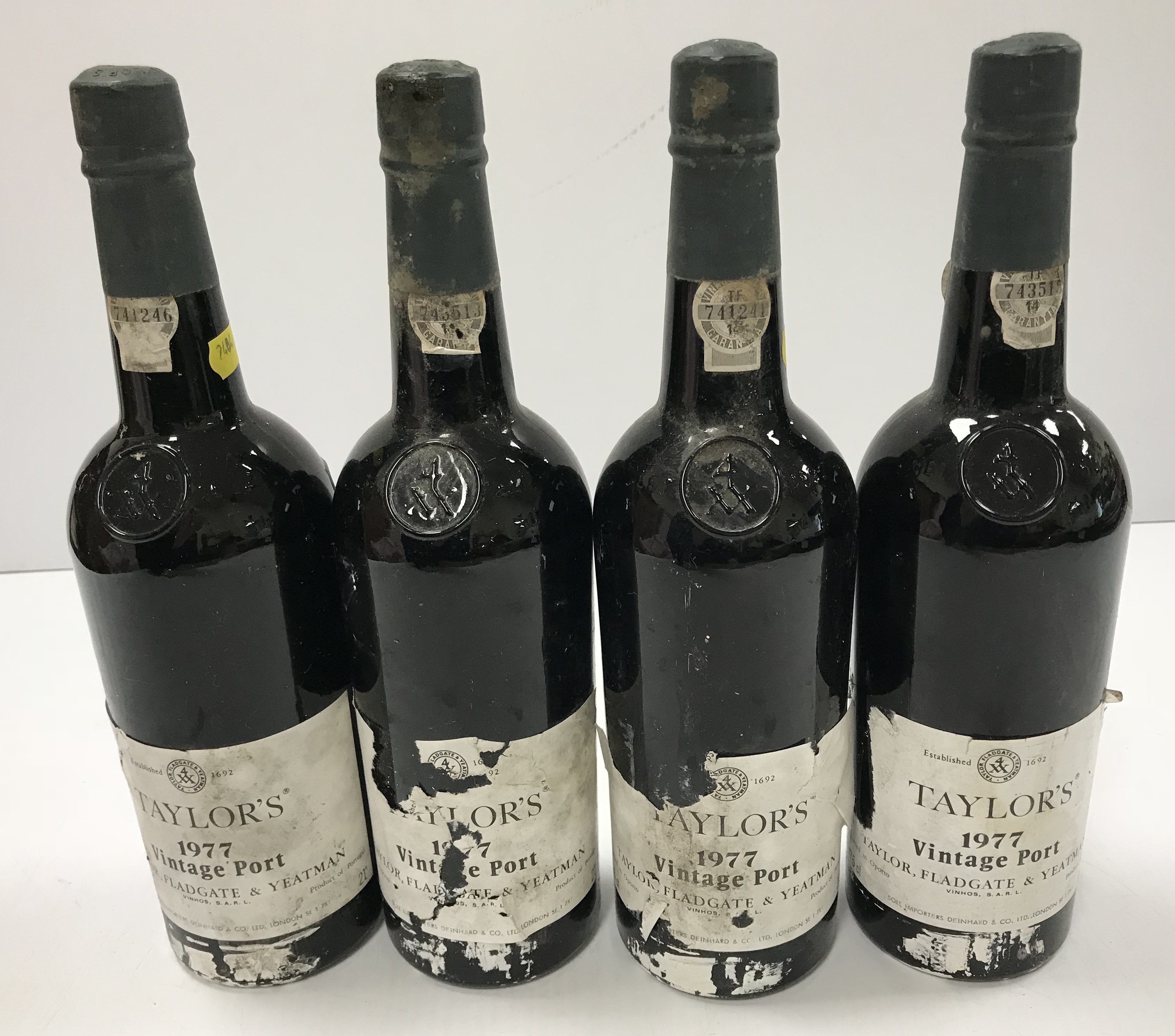 Four bottles Taylor's vintage port 1977 (4)