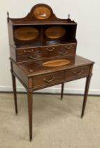 A late 19th Century mahogany and satinwood inilaid bonheur du jour by Edwards & Roberts of London,