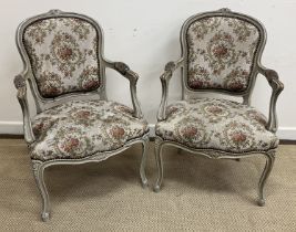 A pair of circa 1900 painted framed elbow chairs in the Louis XV taste,