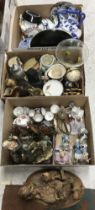 Three boxes of assorted decorative china and glassware to include Lladro,