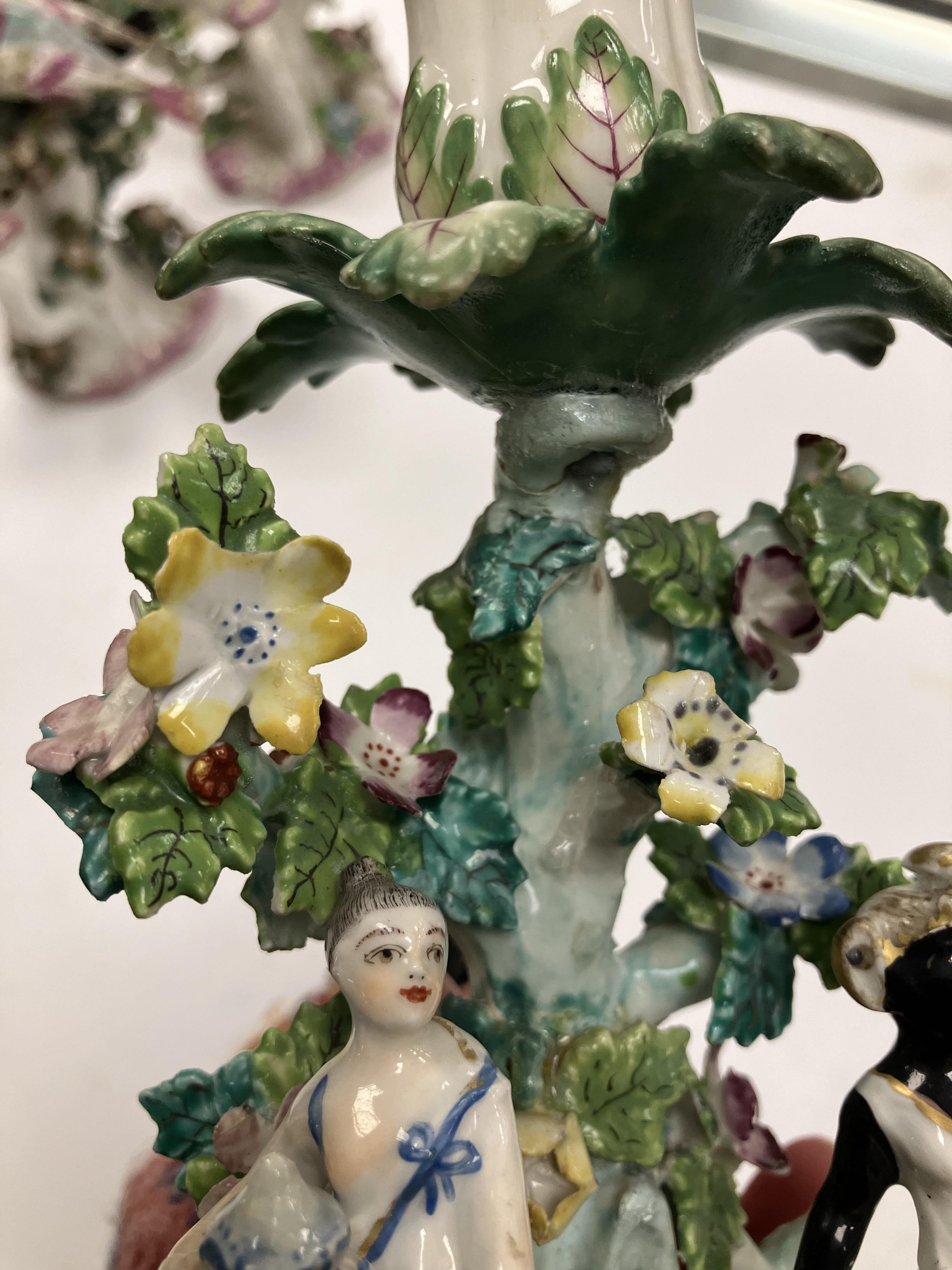 A pair of circa 1765-1770 Bow porcelain candlesticks as birds amongst flower set branches with - Image 30 of 98