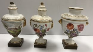 A Job Ridgeway & Sons (circa 1808-14) pair of urns and covers decorated with figures in landscape