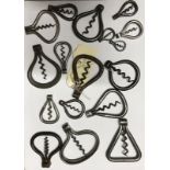 A collection of seventeen various steel bow corkscrews