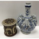 A 19th Century Dutch Delft faience ware vase in the chinoiserie taste with goats head handles and
