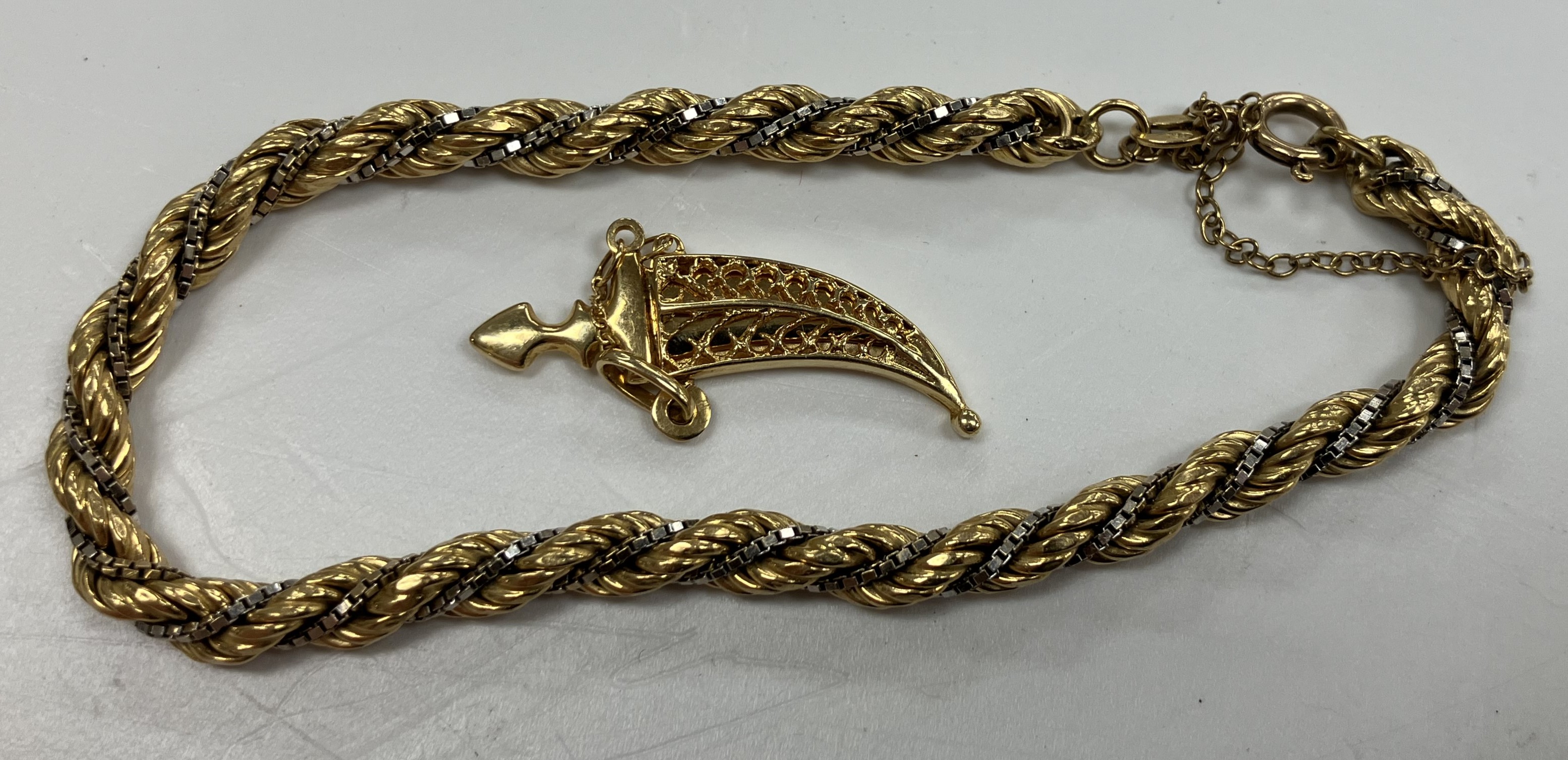 An 18 carat gold bi-colour rope-twist bracelet,