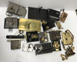 A collection of 27 various 19th Century brass and steel mortice locks and keys,