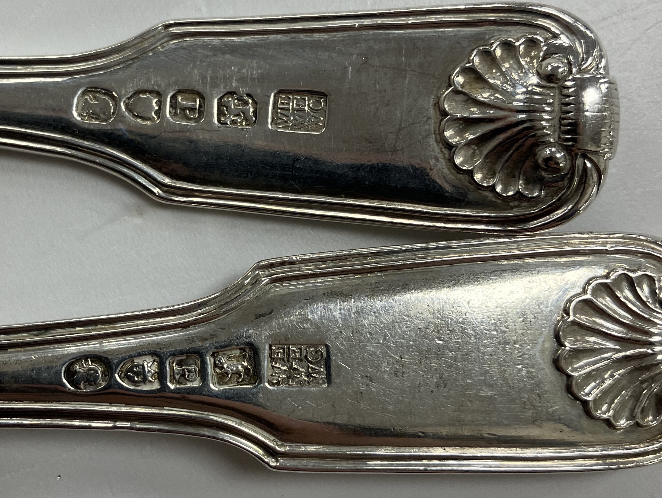 A set of seventeen William IV silver "Fiddle Thread and Shell" pattern dessert spoons (by William - Image 2 of 2