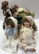 An early 20th Century Schutzemister & Quendt bisque headed doll, stamped "201" to the back of head,