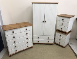 A modern pine and white lacquered bedroom suite comprising two door wardrobe with two drawers,