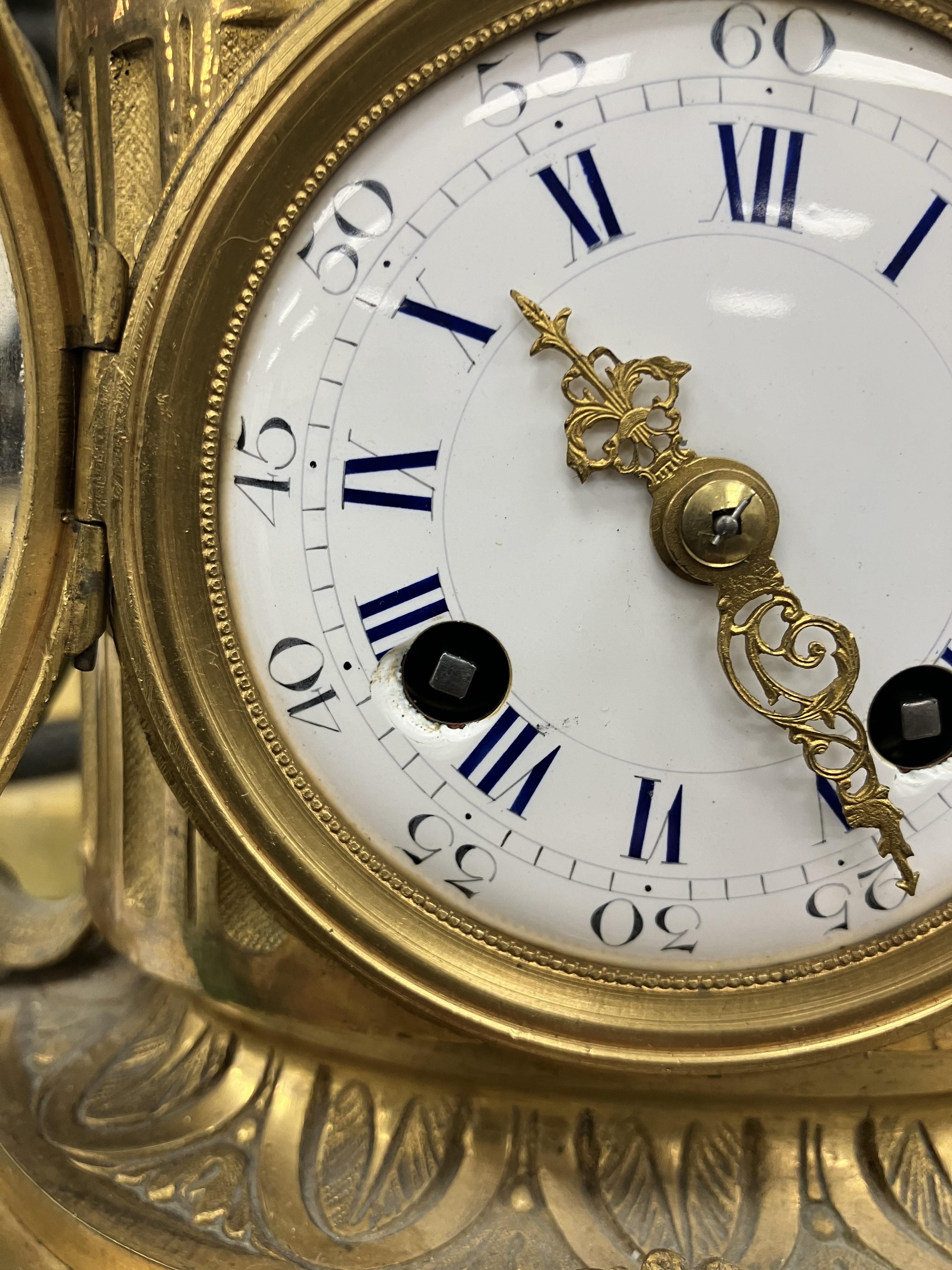 A 19th Century French gilt brass cased mantel clock, - Image 26 of 34