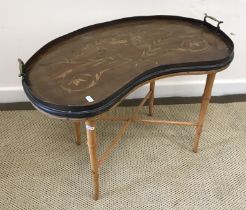 An Edwardian mahogany and marquetry inlaid kidney-shaped drinks' tray with two brass handles,
