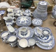 A Woods Yuan ware blue and white dinner/tea service comprising fourteen near matching cups,