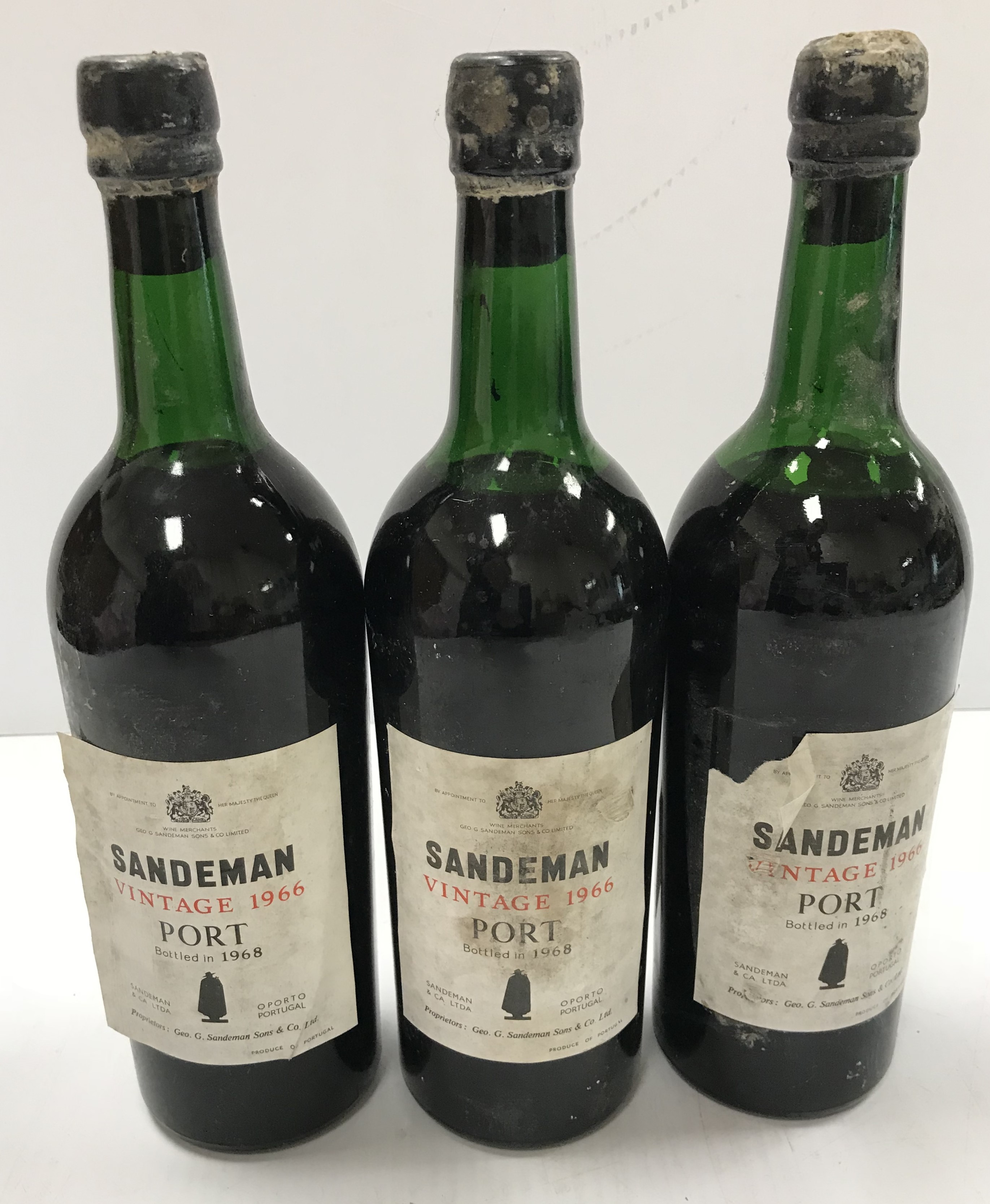 Three bottles Sandeman vintage port 1966,