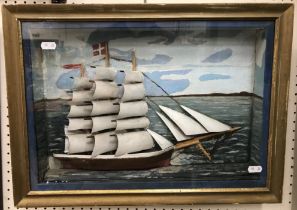 A framed and glazed painted diorama of a Danish three masted sailing vessel at sea, in full sail,