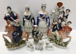 A collection of ten 19th Century Staffordshire figures including Victoria and Albert standing 27.