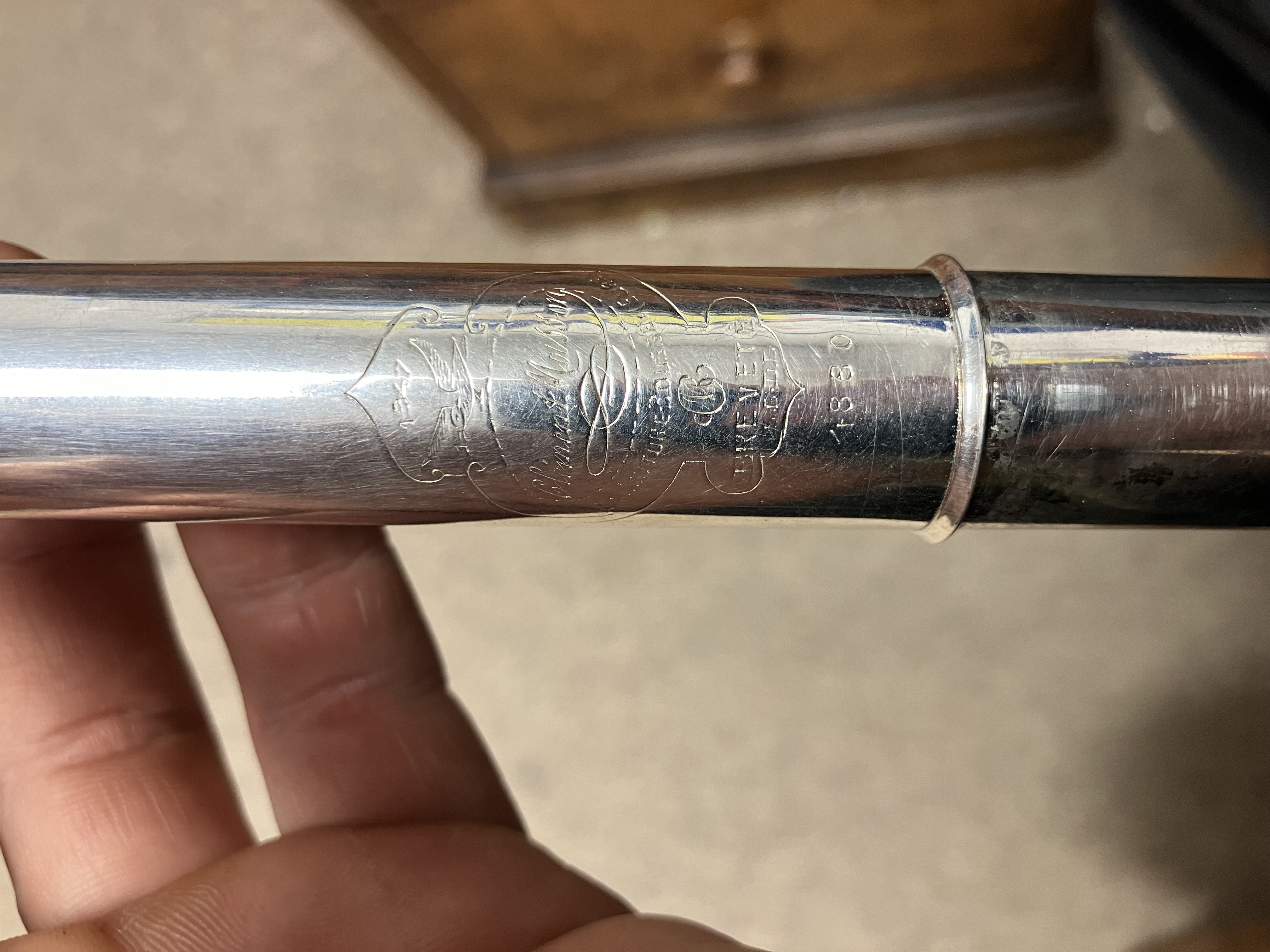 A circa 1947 silver plated flute by Clement Masson bearing engraved maker's mark and date 1947 - Image 10 of 17