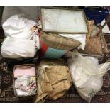 A box containing various household table linens etc to include cotton tablecloths,