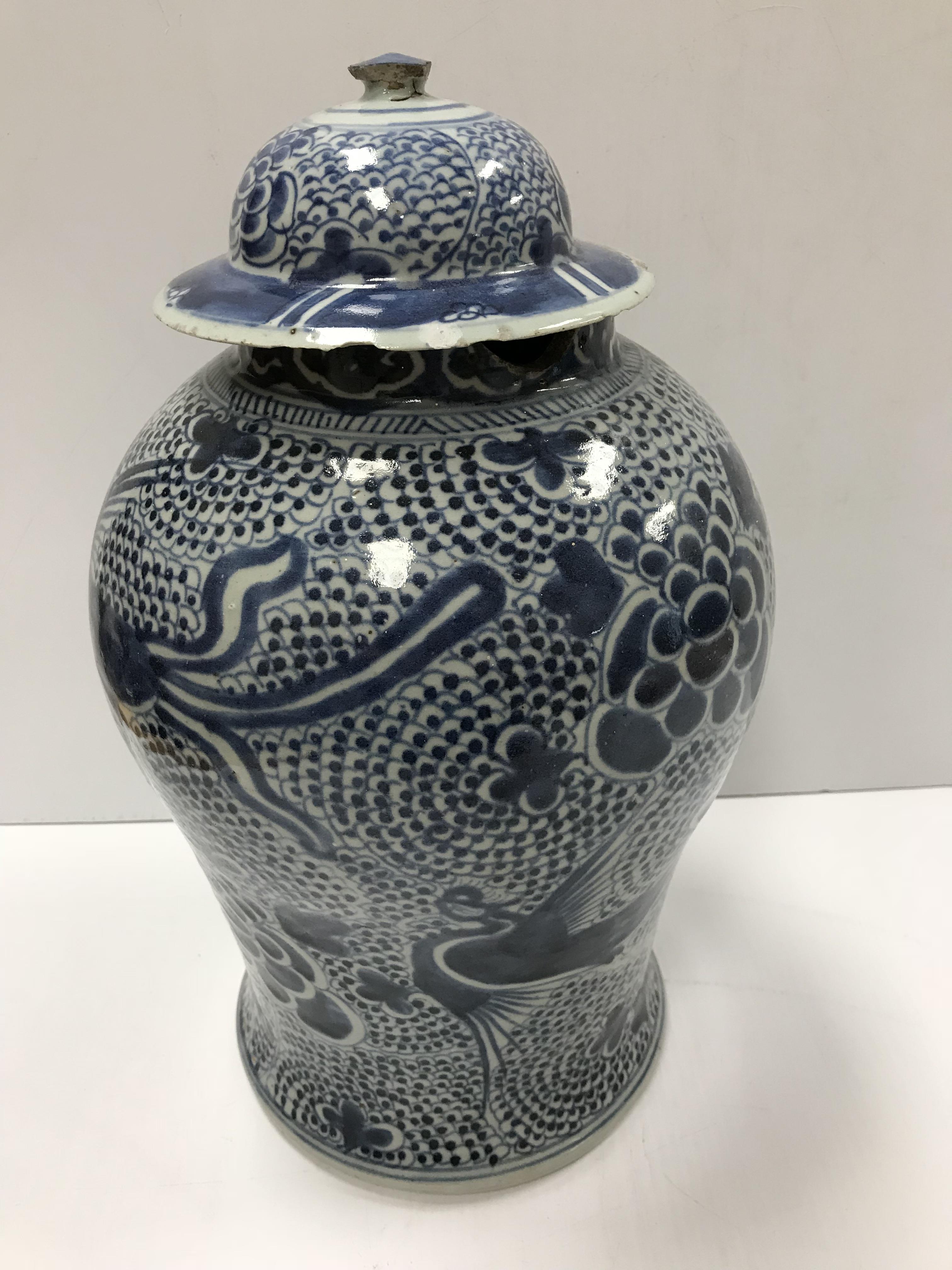 An 18th Century Chinese blue and white baluster shaped vase and cover, - Image 2 of 43