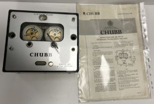 A 1960s Chubb bank vault time delay clock with two times