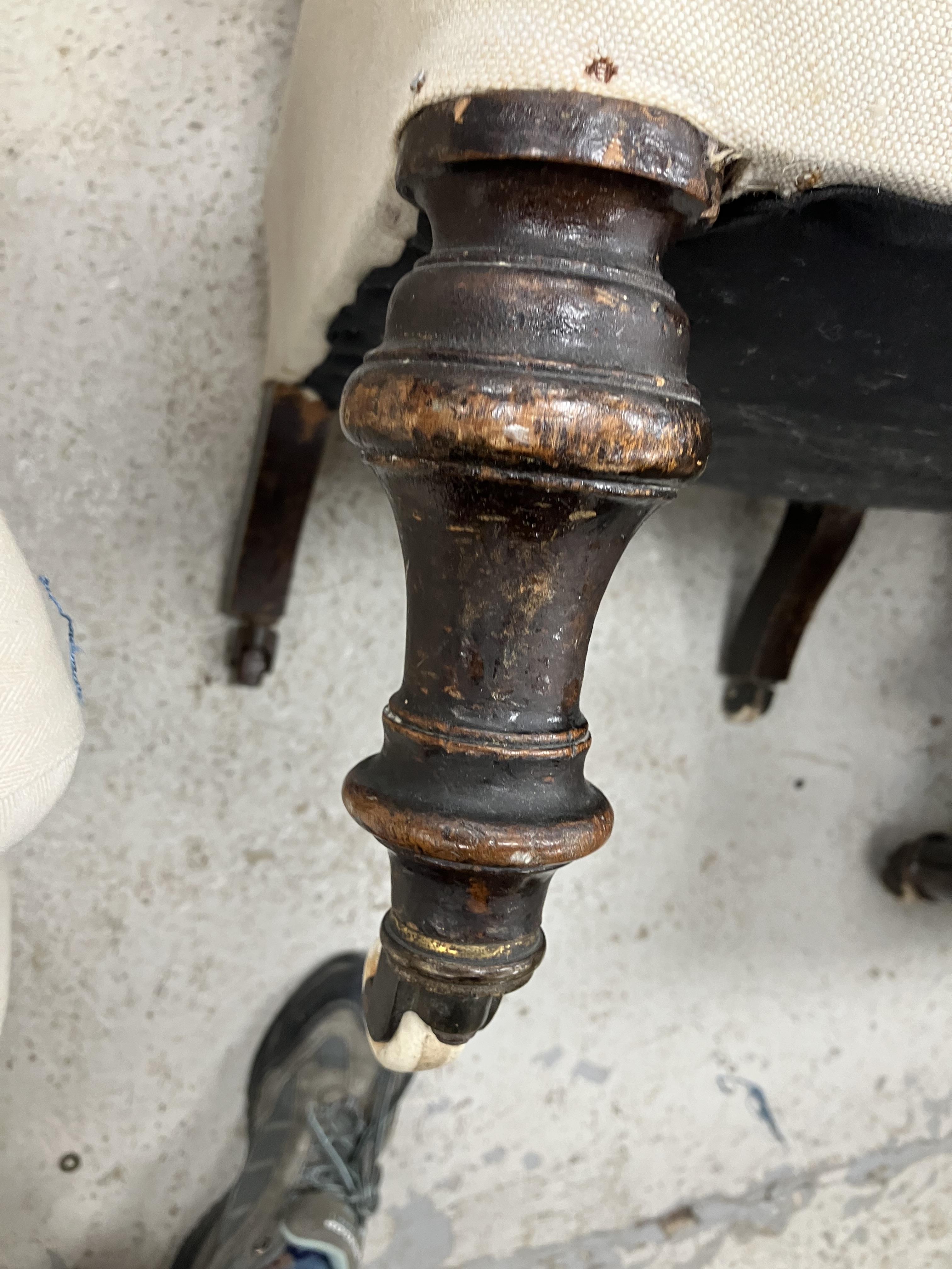 A Victorian upholstered scroll arm chair on ebonised turned front legs to later brass castors, - Image 25 of 52