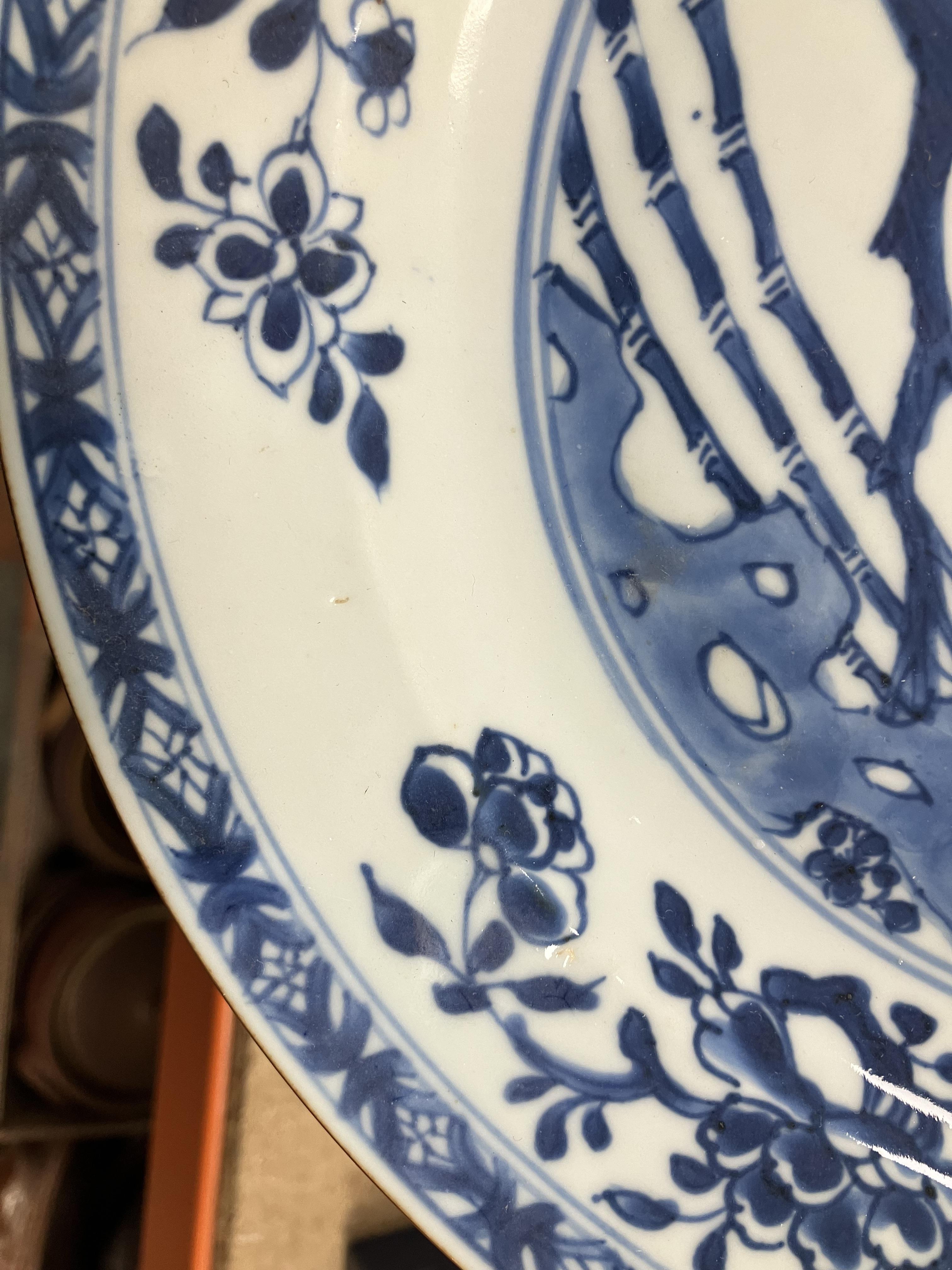 A set of three 19th Century Chinese blue and white export ware plates, - Image 22 of 23