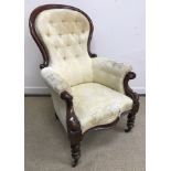 A Victorian show frame, spoon back salon elbow chair with button back and shaped seat,