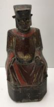 An 18th Century Chinese Qing Dynasty carved and lacquered and gilded decorated temple figure of a