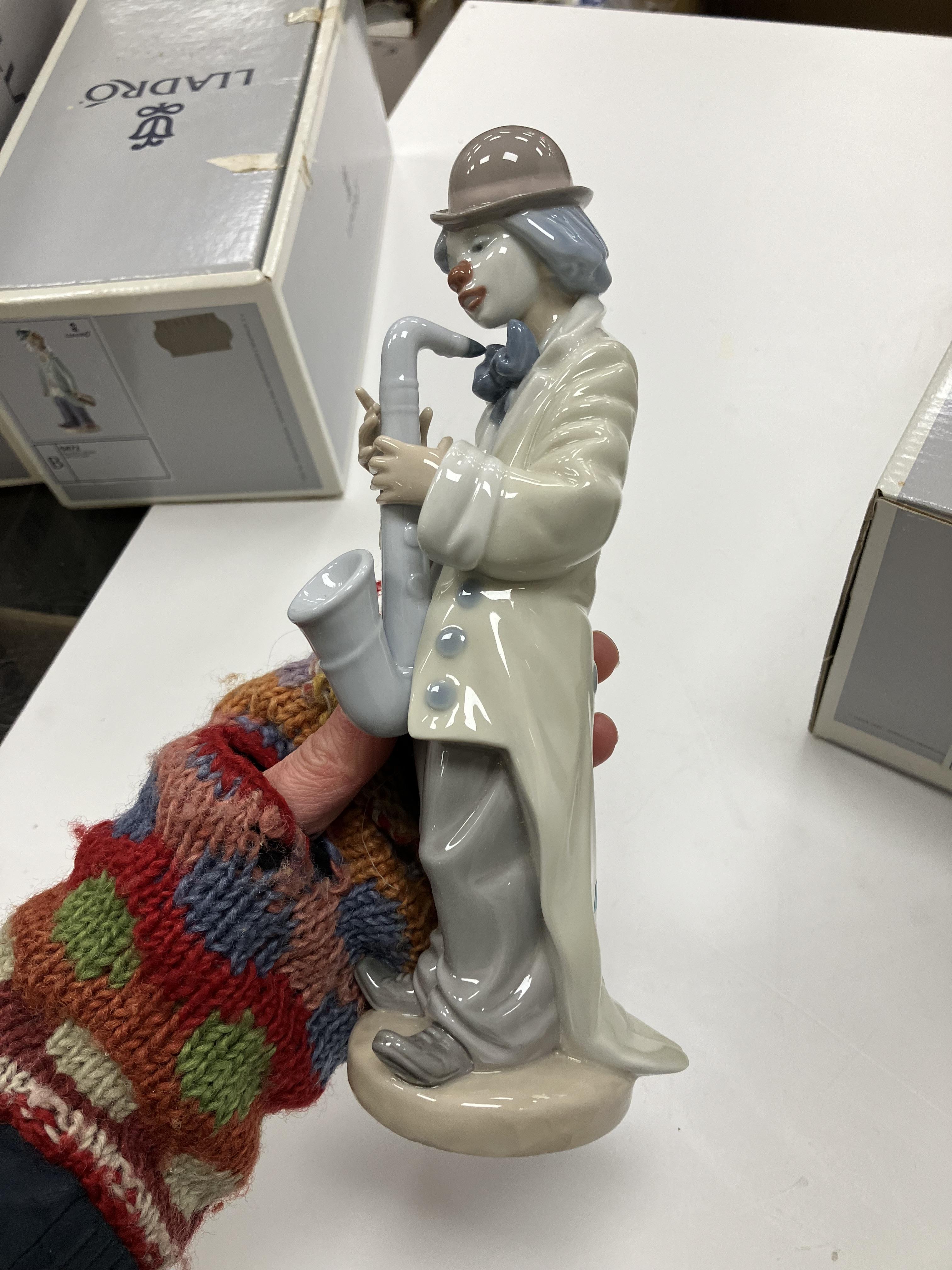 A collection of four Lladro figures "Circus Sam" (No. 5472), "Surprise" (No. - Image 18 of 29