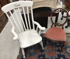A white painted Winsor style elbow chair inscribed "Love" and a dining chair (2)