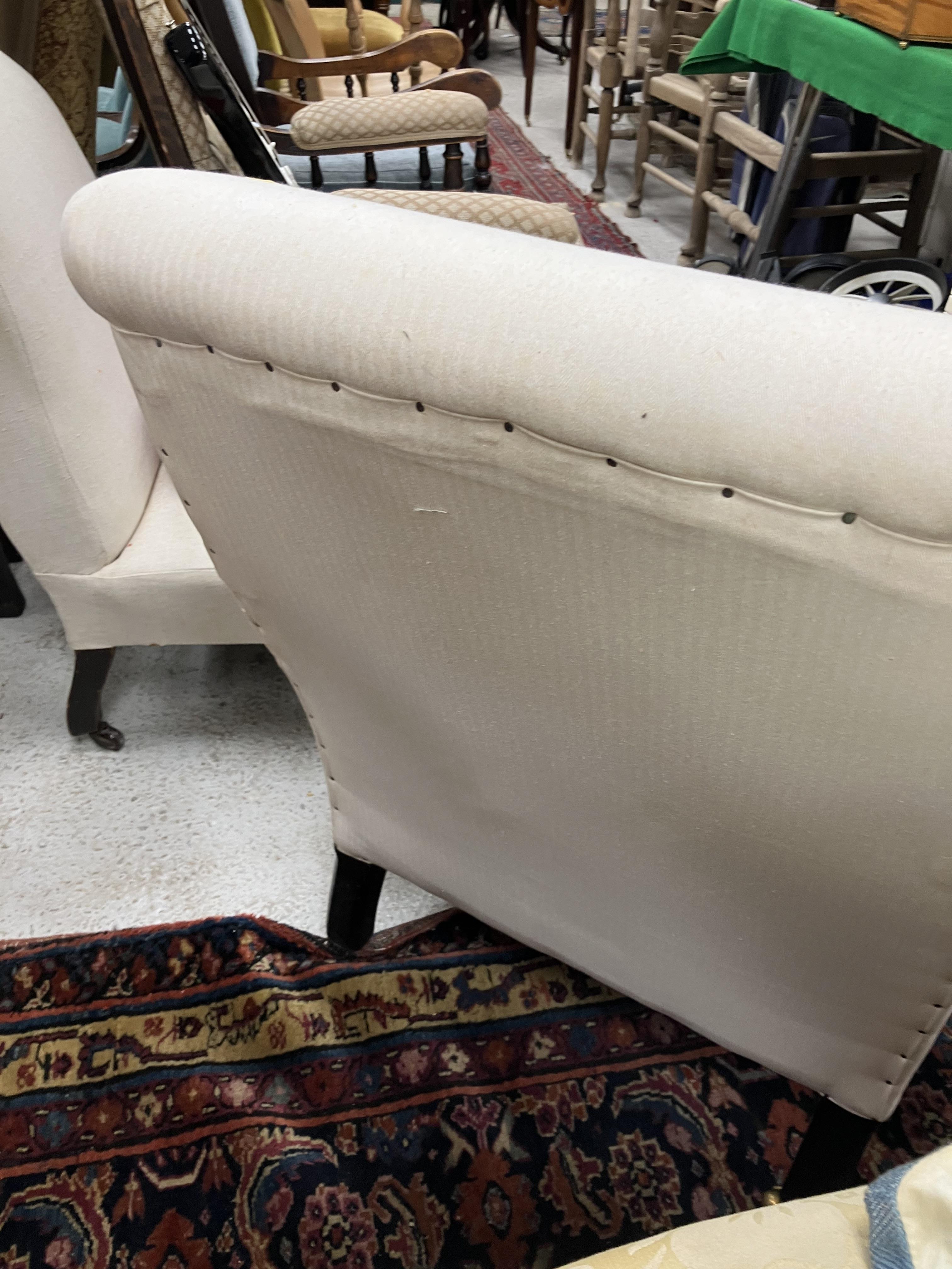 A Victorian upholstered scroll arm chair on ebonised turned front legs to later brass castors, - Image 34 of 52