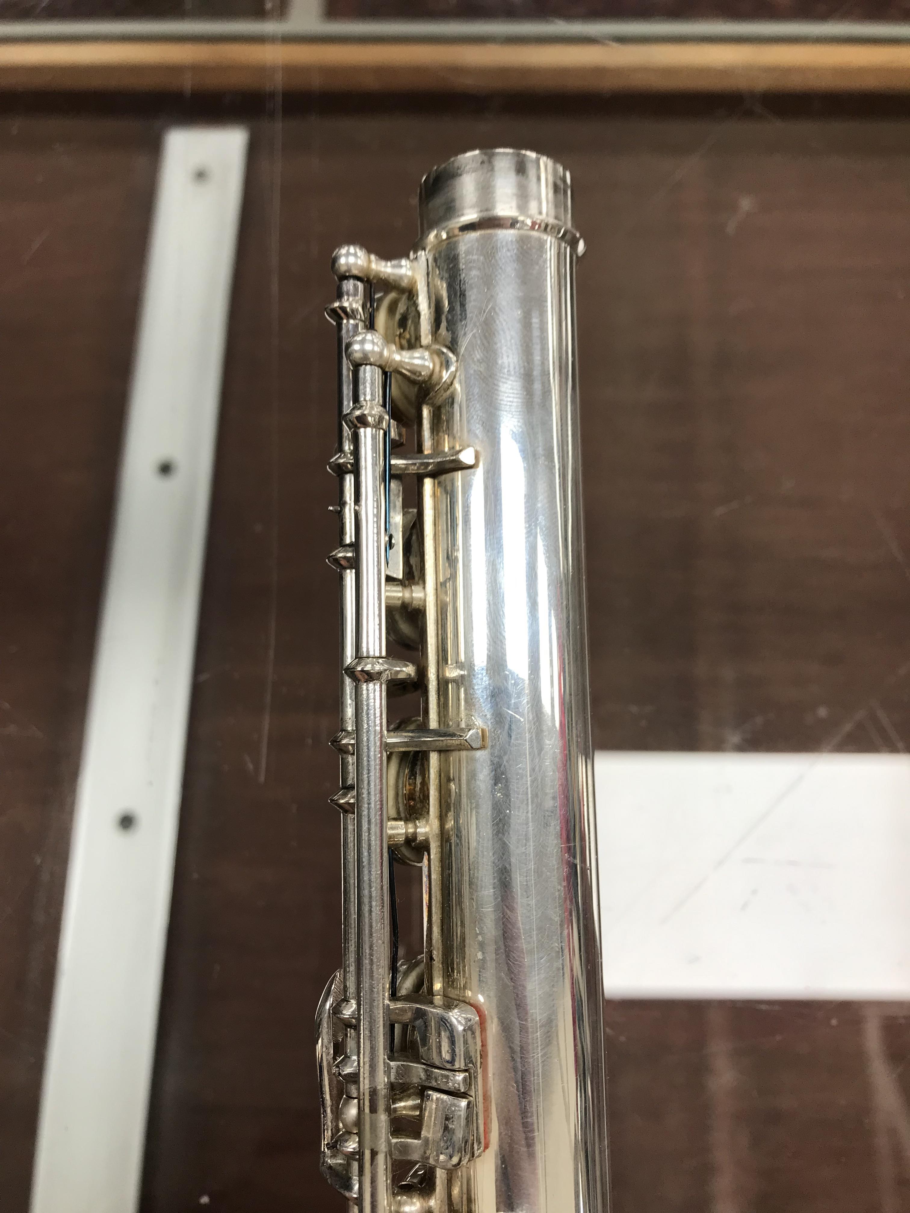 A circa 1947 silver plated flute by Clement Masson bearing engraved maker's mark and date 1947 - Image 2 of 17