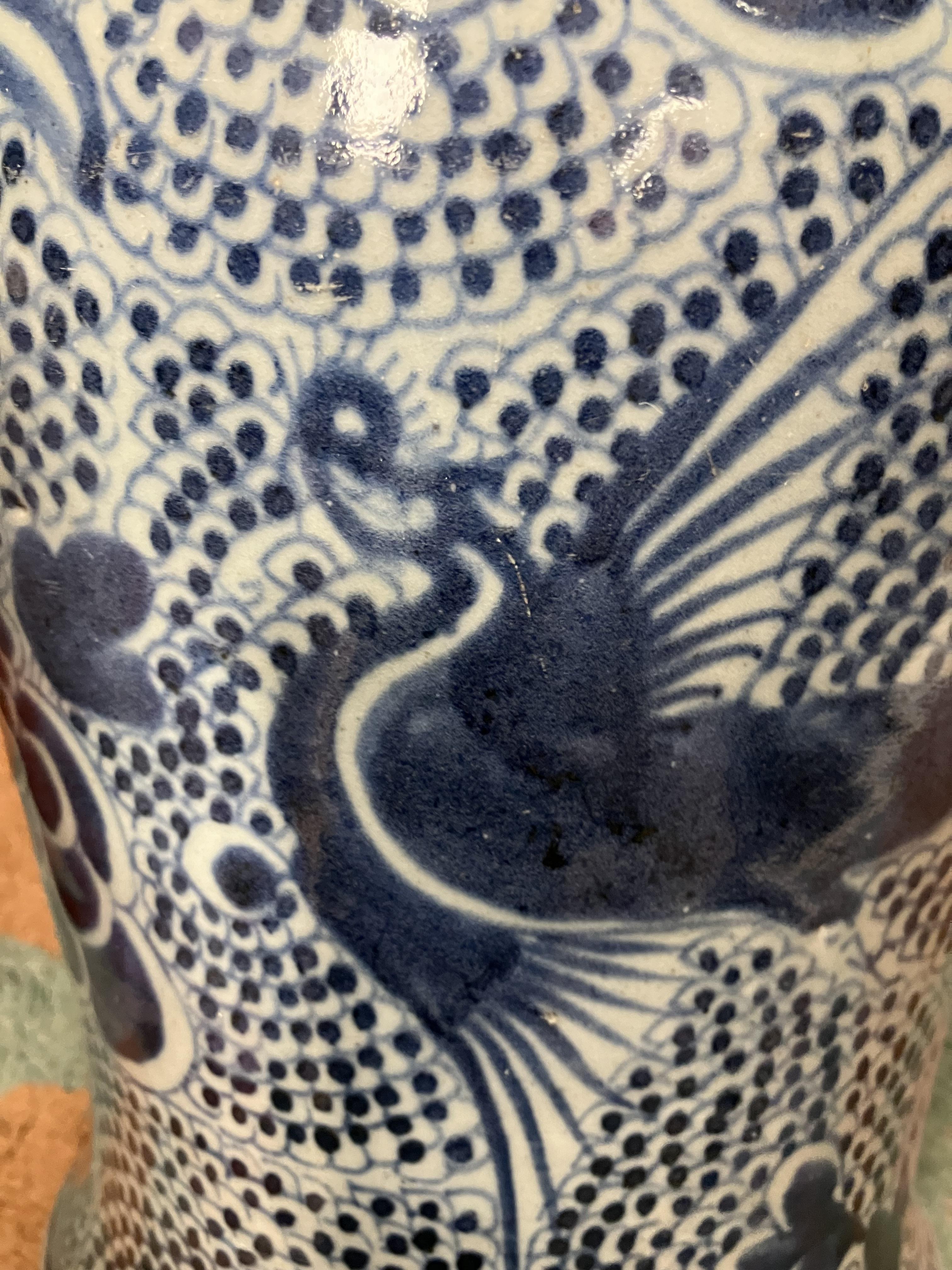 An 18th Century Chinese blue and white baluster shaped vase and cover, - Image 12 of 43