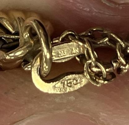 An 18 carat gold bi-colour rope-twist bracelet, - Image 2 of 3