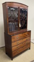 An early 19th Century mahogany secretaire bookcase,