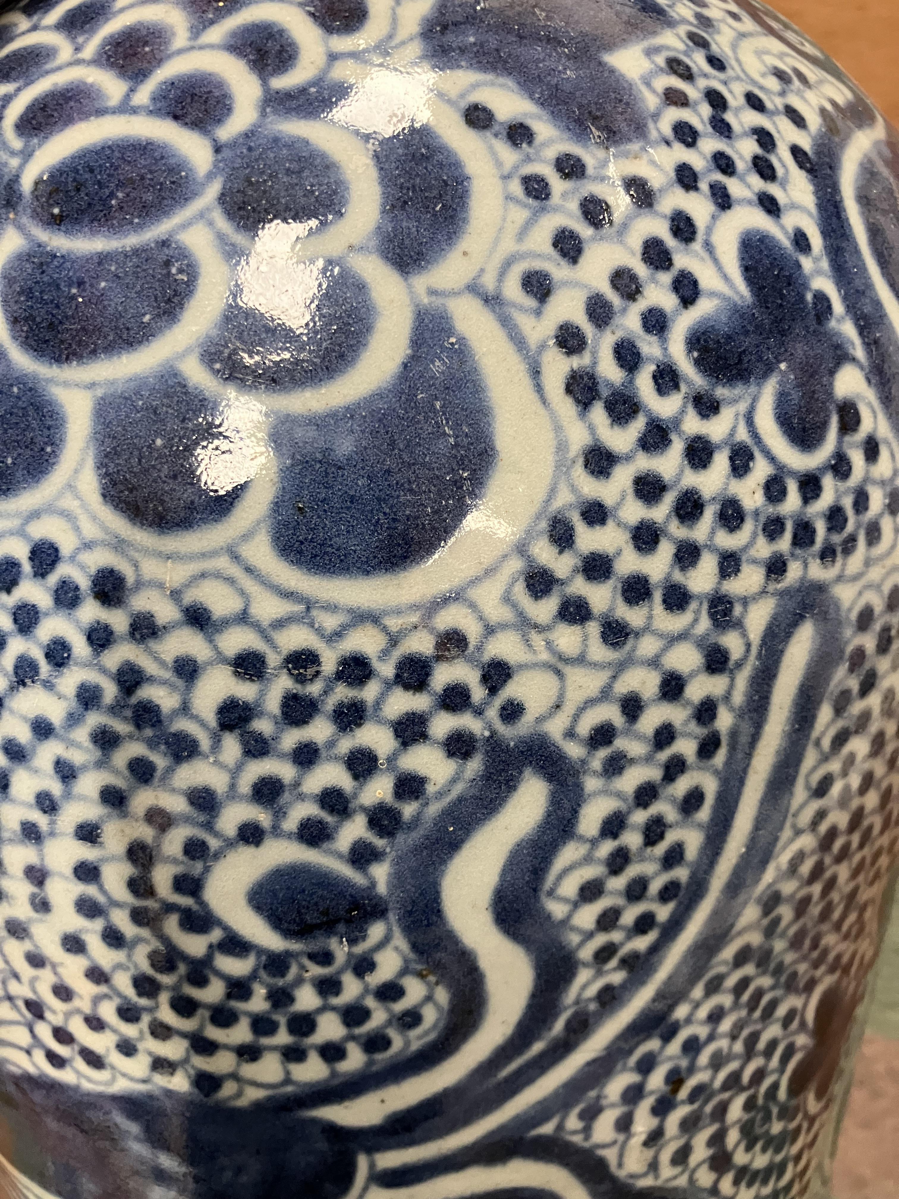 An 18th Century Chinese blue and white baluster shaped vase and cover, - Image 15 of 43