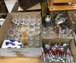Two boxes containing various modern drinking glasses,