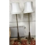 A pair of brass and mahogany four light standard lamps,