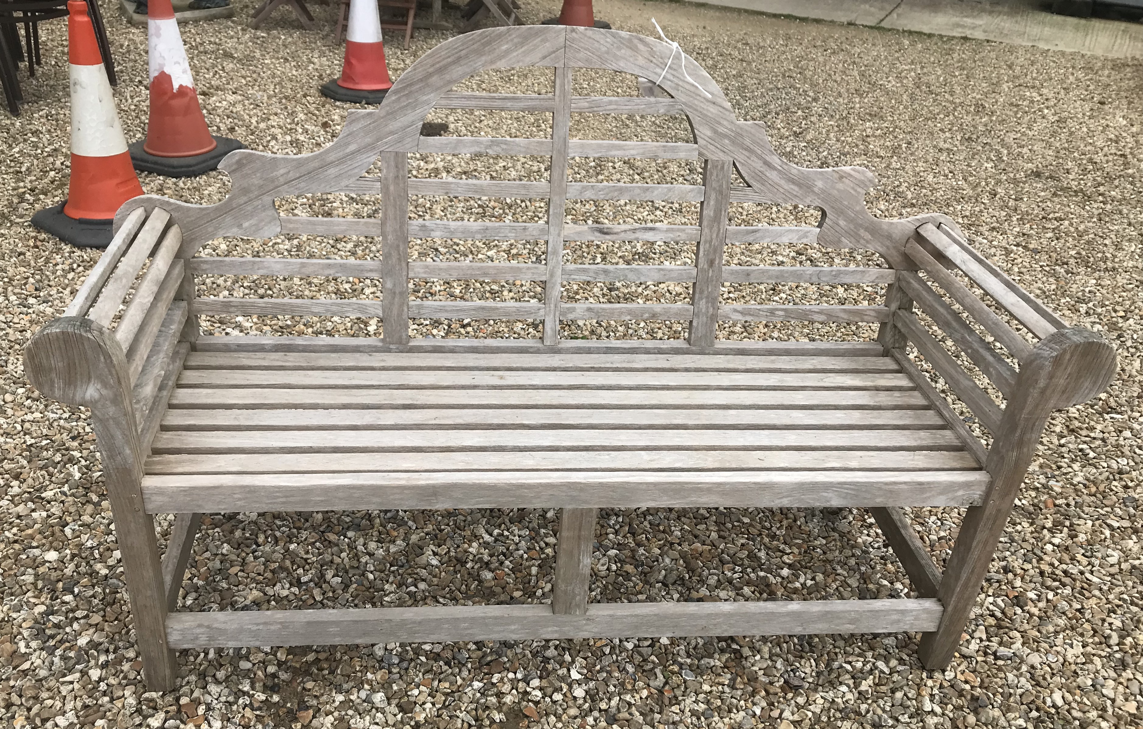 A slatted teak Lutyens design bench 166 cm wide
