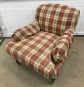 A George Smith 'Howard' style armchair in terracotta/beige check upholstery,