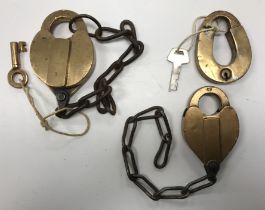 A collection of three 19th Century American brass padlocks including a W Bohnnanan of Brooklyn New