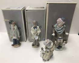 A collection of four Lladro figures "Circus Sam" (No. 5472), "Surprise" (No.