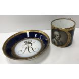 An 18th Century Meissen cup and saucer, royal blue ground and gilt decorated,