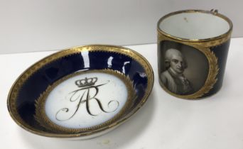 An 18th Century Meissen cup and saucer, royal blue ground and gilt decorated,