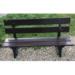 A Great Western Railway bench with wooden slats on cast iron ends 152 cm wide