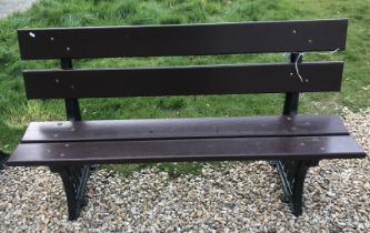 A Great Western Railway bench with wooden slats on cast iron ends 152 cm wide