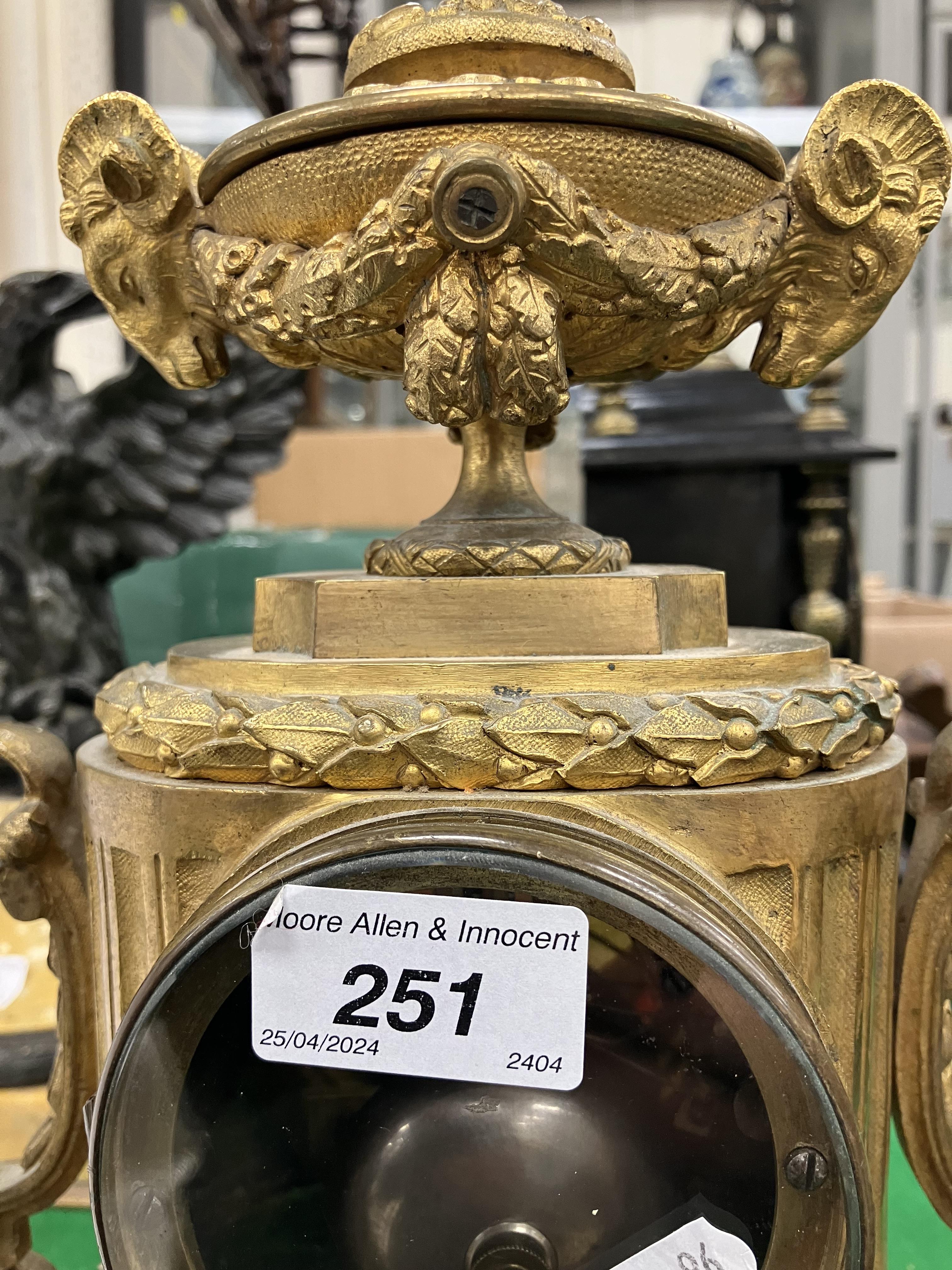 A 19th Century French gilt brass cased mantel clock, - Image 15 of 34