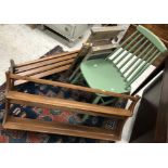 An Ercol elm plate rack, 96.