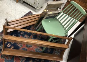 An Ercol elm plate rack, 96.